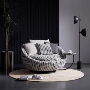 Wohnzimmer großer runder Schwenkstoffsitzstuhl mit Tisch